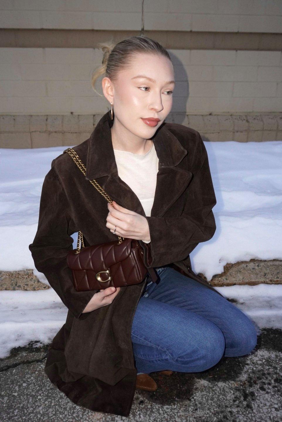 Model with an everyday bag