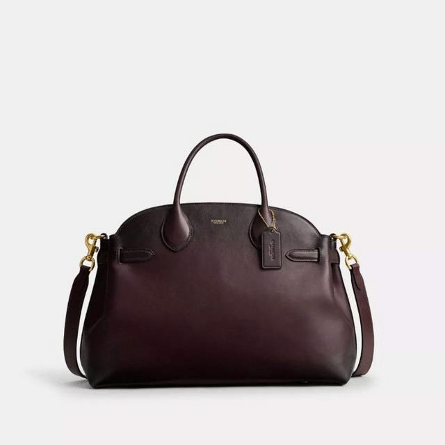 Coach dark brown leather handbag with top handle and detachable shoulder strap with gold hardware.