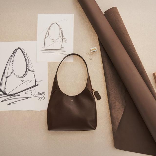 Brooklyn shoulder bag 28 crafted of maple natural grain leather with visible hangtag