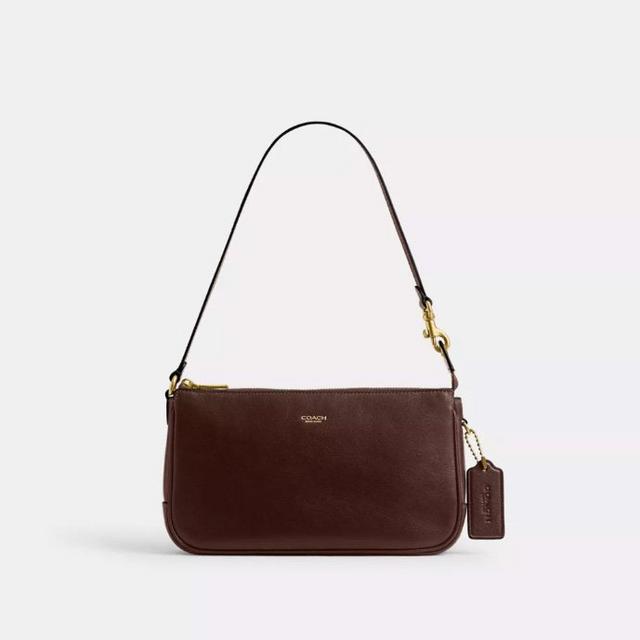 Coach brown leather shoulder bag with adjustable strap and gold-tone hardware with attached tag.