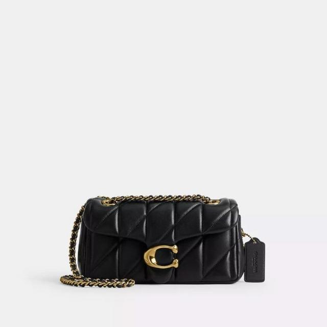 Black quilted leather shoulder bag with gold chain strap and Coach logo clasp closure.