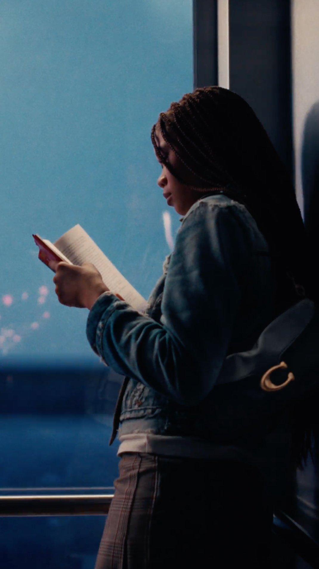 Storm Reid wearing the Tabby Shoulder Bag 26 in Soft Grain Leather in Coach Spring 2026 Découvrez votre histoire campaign