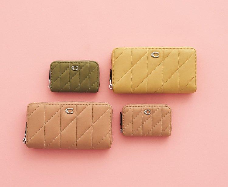 【新品】日本限定　COACH がさばる財布を持ち歩きたくない時に❤︎ COACH コーチ 新作 C6001 花柄 二つ折り財布 ブティックライン
