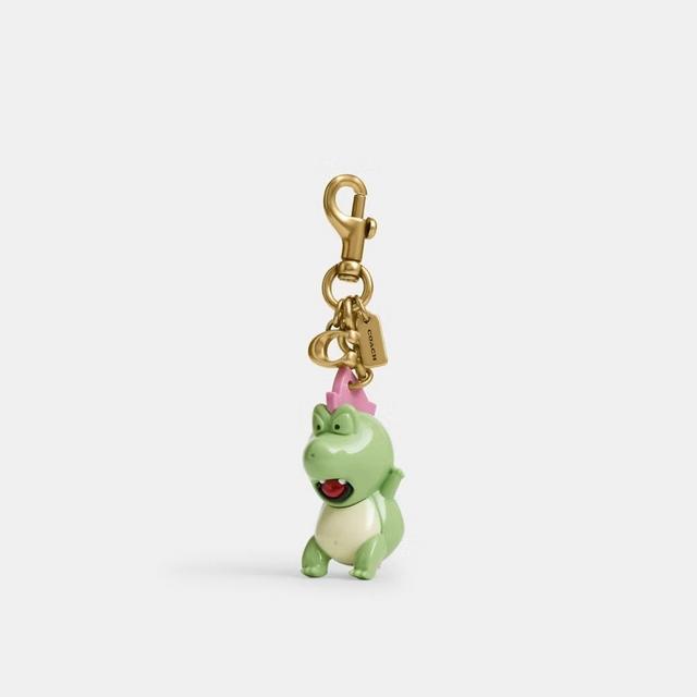 A playful bag charm featuring the green dinosaur mascot "Derby".