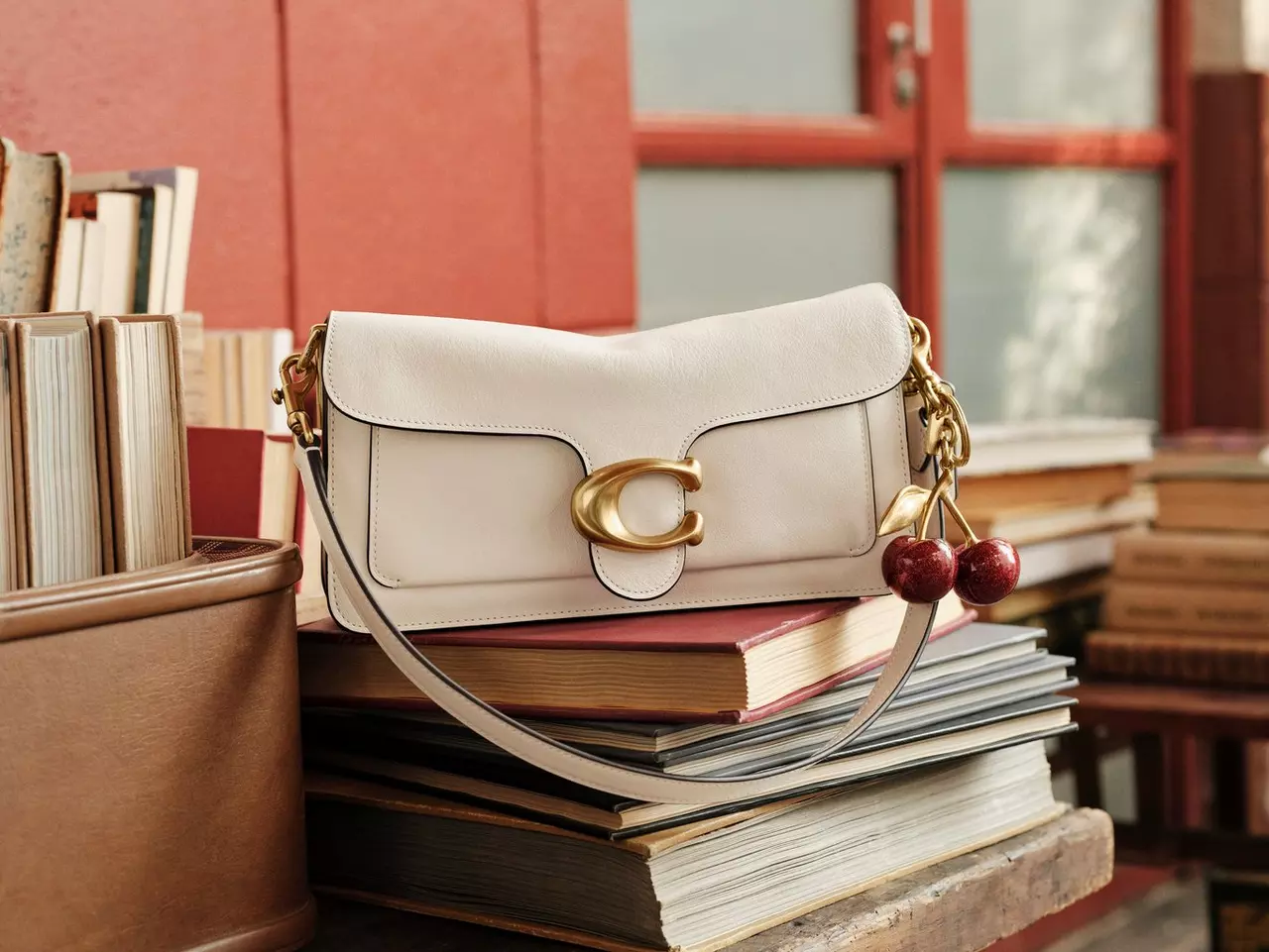 White Tabby bag styled with books